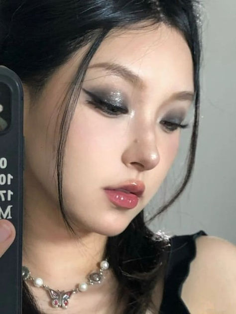 Smokey eye makeup look: shimmery dark gray Douyin New Year Makeup, Smokey Eye Douyin Makeup, Korean Smoky Makeup, Grey Douyin Makeup, Douyin Smokey Makeup, Silver Douyin Makeup, Smokey Douyin Makeup, Douyin Smokey Eye, Dark Korean Makeup