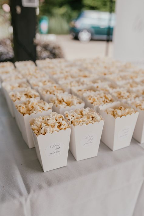 It was all about the details for Issy + Tom's August super stylish wedding at Hayne House in Hythe! No detail was left unconsidered - they used photos of their parents on their wedding days as decor, polaroids of the couple were everywhere and the bride even designed and made a wedding newspaper all about the couple which was placed on tables for guests to enjoy. Captured by natural, heartfelt wedding photographer Shelby Ellis Photography. Wedding Favor Snacks, Birthday Party Movie Night, Party Movie Night, Popcorn Cups, Popcorn Wedding, Snack Station, Wedding Snacks, White Popcorn, Popcorn Boxes