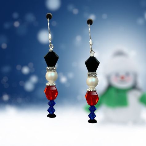 Limited Edition DIY Jewelry Kit - Nutcracker Earring by Toocutebeads.com Ignite your festive spirit with our Nutcracker Earring DIY Jewelry Making Kit. This limited-edition kit allows you to create your own unique pair of Christmas earrings, combining vintage Swarovski crystals with sterling silver. The result? A captivating pair of earrings that embody the joy and charm of the holiday season. Key Features & Benefits: Limited Edition: As part of a unique, limited edition series, this kit provide Beaded Nutcracker Earrings, Beaded Snowman Earrings Diy, Nutcracker Beaded Earrings, Christmas Nutcracker Earrings, Christmas Charm Earrings, Christmas Diy Jewelry Ideas, Xmas Earrings Diy, Christmas Earing Diy, Diy Christmas Earrings Easy