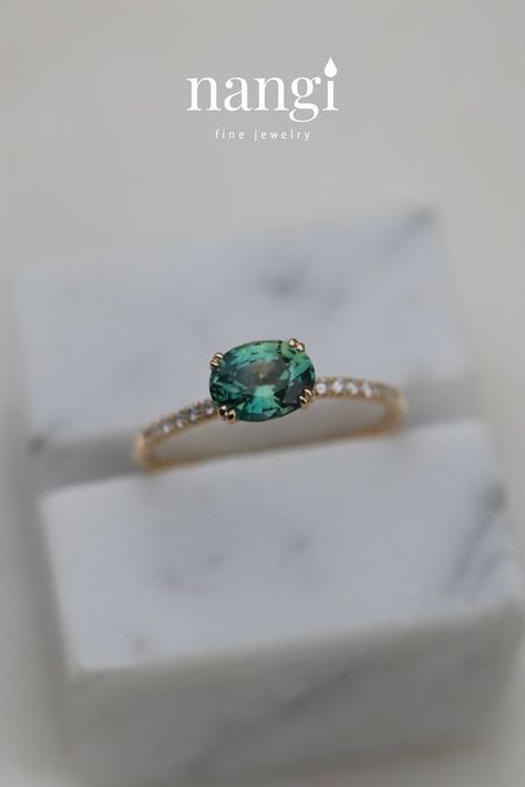 Gemstone Ring. An oval, green sapphire set in our east-west setting with double prongs. Sapphire Side Stones, Green Sapphire, East West, Ring Band, Sapphire Diamond, Lab Grown Diamonds, Sapphire Ring, Gemstone Rings, Sapphire