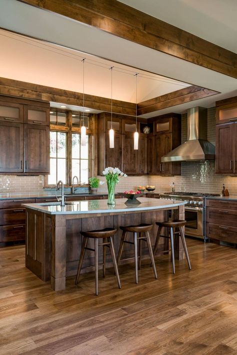 Are you tired of your brown kitchen cabinets? Do they feel outdated or past their prime? You aren’t alone. Brown cabinets were extremely popular in traditional kitchen designs throughout the 1900’s. Now, in the 21st century, many are wondering if brown kitchen cabinets are out of style. Homeowners are ready to ditch their chocolate-toned kitchens in favor of more modern color schemes. But is this hasty decision? Are brown cabinets in fact out of style?