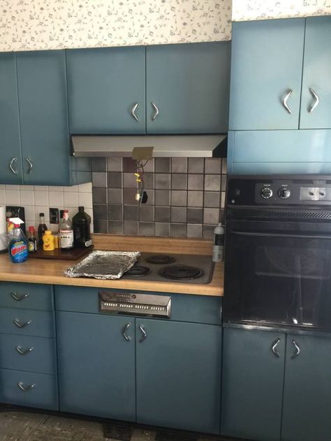 What a lovely color — burnt blue, I’ll call it — in these vintage Youngstown steel kitchen cabinets for sale on craigslist in metro St. Louis. I don’t think we’ve ever seen this color in the wild. It’s makin’ me feel bicentennial chic. Thanks to ready Wendy for the tip, and to seller K, who … Metal Kitchen Cabinets Makeover, Vintage Kitchen Cabinets 1950s, Vintage Metal Kitchen Cabinets, 1950s Kitchen Cabinets, Kitchen Credenza, Metal Kitchen Cabinets, Steel Kitchen Cabinets, Vintage Kitchen Cabinets, Kitchen Cabinets For Sale