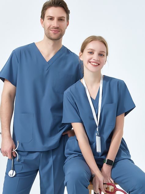 Perfect for medical professionals, this ceil blue scrubs quick-dry scrub top and pant set is crafted from a stretch polyester and spandex blend. Quick-drying technology ensures you stay dry and comfortable during long shifts. Enjoy the perfect fit and feel of this light, professional scrub set. This scrub top and pant set is designed for durability with reinforced stitching and fade-resistant dye technology. Maximize your comfort with breathable fabric, and benefit from flexibility with a 4-way Lab Coats For Men, Ceil Blue Scrubs, Medical Scrubs Outfit, Stylish Scrubs, Doctor Scrubs, Navy Scrubs, Doctor Dress, Fit Scrubs, Doctor Outfit