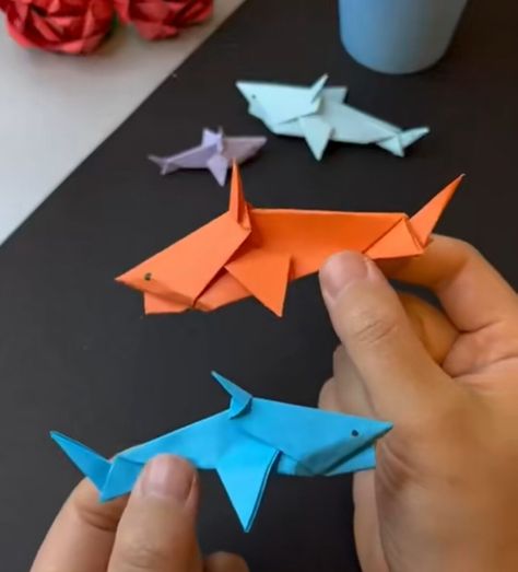 simple origami shark Shark Origami Easy, Shark Decorations Diy, Shark Origami, Origami Printables, Paper Shark, Origami Shark, Easy Origami Tutorial, Shark Craft, Simple Origami