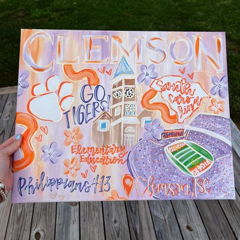 Happy Sunday ☀️ Here is another fun Clemson custom that I painted over the weekend. Message me to place your order ✨ #designsbyyyc #smallbusiness #smallbusinessowner #custom #collegepainting #clemson #clemsonfootball #clemsontigersfootball #love #custompaint #custompainting Clemson Canvas Painting, Custom College Painting, Clemson Room Decor, Clemson Artwork, Preppy Dorm Painting, Diy Dorm Paintings, Clemson Painting, College Canvas Paintings, Clemson Art