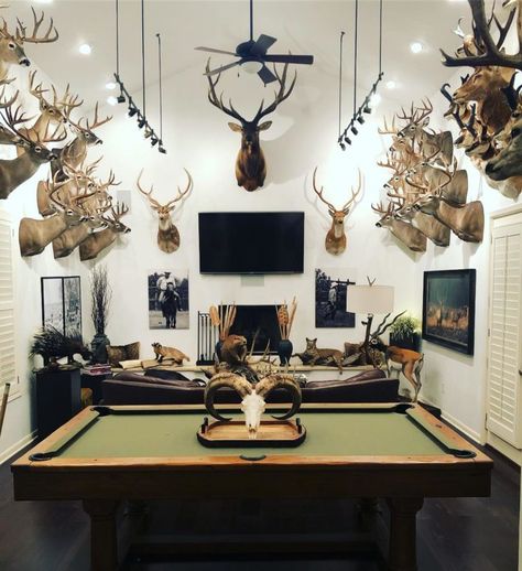 Trophy Room Lighting, Man Cave With Deer Mounts, Hunter Trophy Room, Hunting Game Room Ideas, Hunting Game Room, Hunting House Ideas, Modern Taxidermy Decor, Boho Man Cave, Hunting Den Ideas Man Cave