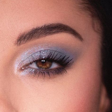 ColourPop Cosmetics on Instagram: "@nessasunshine channeling chill girl energy with our NEW So Elemental palette 🌊✨💿 9 shades of blissful blues and serene, sparkling silvers  NOW AVAILABLE at @UltaBeauty and at colourpop.com! 💙  #denimbluemakeup #bluemakeup #y2kmakeup #2000smakeup #ultabeauty #colourpop" Silvery Blue Eye Makeup, Light Blue Sparkly Eye Makeup, Light Blue And Silver Eye Makeup, Silver Blue Makeup Looks, Quince Makeup Blue Silver, Dusty Blue Eyeshadow, Shimmery Blue Eyeshadow, Simple Light Blue Eyeshadow Looks, Periwinkle Makeup Looks For Prom