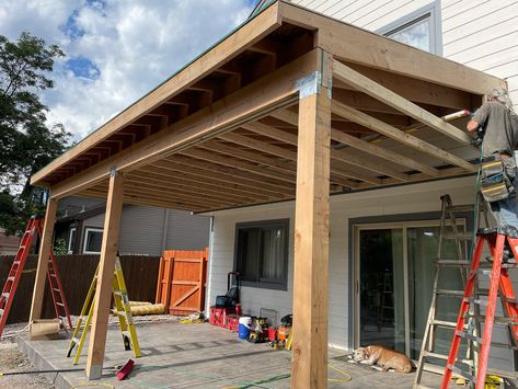 🌞 Elevate your outdoor space with a custom-designed patio overhang! 🌿 We can design it exactly how you like, creating the perfect blend of style and functionality. Imagine a space where you can relax, entertain, and enjoy the outdoors, no matter the weather. Check out this stunning example and start envisioning your dream patio! 🏡✨ #CustomDesign #OutdoorLiving #PatioPerfection #HomeUpgrade #BackyardHaven #ShadeSolutions #StonebrookConstructionGroup #FortCollins Garage Expansion, Patio Overhang, Porch Overhang, Deck Roof, Ideas Terraza, Framing Construction, Dream Patio, Patio Enclosures, Handy Man