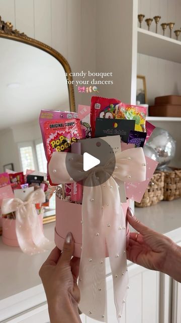 Deborah Trette on Instagram: "dance recital season has entered the chat 💬 here is a cute way to gift your performers something sweet! these are for my 9 + 11 year olds — you can customize according to age! 

+candy (sweet and savory)
+chocolate bars
+eye masks
+lipgloss
+gift cards
+hair clips
etc!

save + share! 🔗 under @shop.ltk 
@threadmama_story has super cute dance printables too!

#diy #diygift #giftidea #giftbox #giftforher #dancer #graduation #gradgift #candybouquet #diybouquet #diycrafts #diymom #momlife" Diy Recital Gifts, Ballet Recital Bouquet Ideas, Dance Recital Gifts Diy Ideas, Dance Big Sister Gifts, Big Sis Lil Sis Gifts Dance, Dance Buddy Gifts Ideas, Diy Dance Gifts, Recital Gifts For Dancers, Dance Recital Gifts Diy