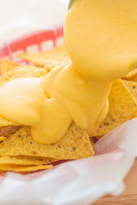 Nacho Cheese is easy to make yourself from scratch, and is the perfect melty sauce to pour over tortilla chips. This Nacho Cheese Sauce is made with only five all-natural ingredients, and takes 10 minutes to make. Chips Sauce, Homemade Nacho Cheese, Homemade Nacho Cheese Sauce, Nachos Cheese Recipe, Nacho Sauce, Tortilla Recipes, How To Make Cheese Sauce, Homemade Nachos, Homemade Tortilla