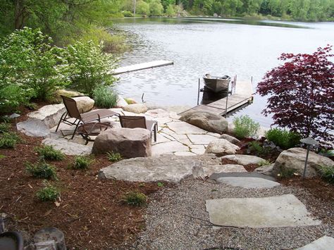 Shoreline Landscaping | Lakescaping | Grand Rapids, MI Lakeshore Landscaper Lake House Backyard, Lake Landscaping, Lake Dock, Fire Pit Landscaping, River Cabin, Lakeside Living, Lakefront Property, Cabin Exterior, Pond Landscaping