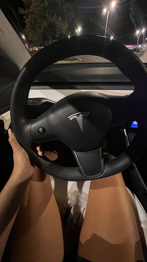 Tesla Vision Board, Aesthetic Tesla Interior, White Tesla Aesthetic, Black Tesla Aesthetic, Tesla Aesthetic Girl, Tesla Pictures, Aesthetic Tesla Car, Tesla Driving Aesthetic, Dream Car Aesthetic Tesla