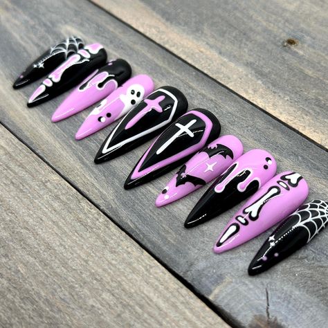 Pink and Black Halloween Press On Nails | Hand-Drawn Coffins, Crosses, Ghosts, Slime Drip, Bones, Bats, and Spiderwebs Goth Nails Halloween, Goth Pastel Nails, Pastel Goth Nails Short, Pastel Witch Nails, Planchette Nails, Pink Black Halloween Nails, Girly Goth Nails, Kawaii Goth Nails, Bat Nails Designs