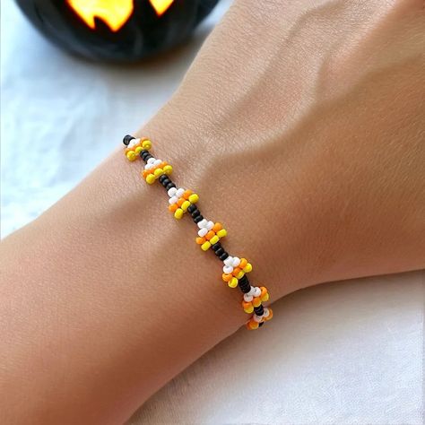 Candy Corn Beaded Bracelet Tutorial | The Bead Mix Candy Corn Seed Bead Bracelet, Where To Buy Seed Beads, Halloween Seed Bead Necklace, Pumpkin Seed Bead Bracelet, Seed Bead Bracelets Loom, Seed Bead Charm Patterns, Seed Bead Projects Ideas, Fall Seed Bead Bracelets, Glass Bead Embroidery