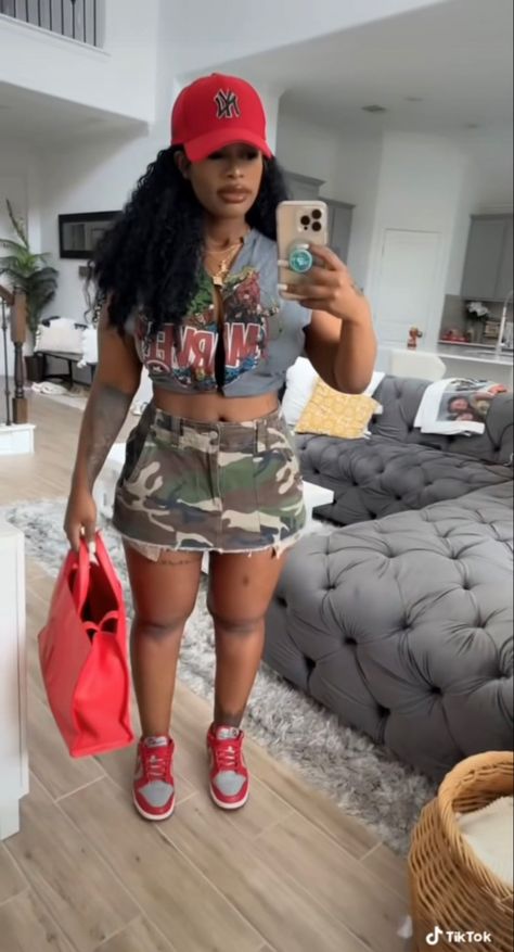 Graphic Tee Dress Outfit Black Women, Camo And Red Outfit Women, Baddie Day Party Outfit, Urban Summer Outfits Black Women, Camouflage Skirt Outfit Black Women, Camo Shorts Outfit Women Summer, Army Shorts Outfit Black Women, Hiking Outfit Summer Black Women, Camo Shorts Outfit Black Women