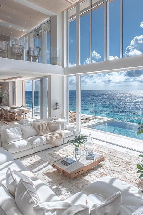 Beach House Colorful Interior, Coastal Concept Interior Design, Beach Home Inspiration, Florida Luxury Home Interiors, Modern Houses Aesthetic, White Beach House Aesthetic, Modern Coastal Home Aesthetic, Coastal Beach House Interiors Living Room, Living By The Ocean