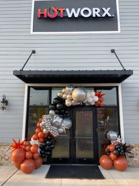 Beautiful black, orange, and silver with some DISCO action to kick off the grand opening of local favorite workout studio, HOTWORX🪩🔥❤️ Balloon Decorations For Shop Opening, Grand Opening Balloons Decoration, Shop Opening Balloon Decoration, Balloon Garland Entrance Door, Grand Opening Balloon Ideas, Grand Opening Balloon Decor, Grand Opening Balloons, Balloon Display, Love Balloon