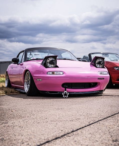 — via that.96miata || pink car, miata, jdm, mx5, mazda, aesthetic, sports car, car girl, expensive, interior, decor, mods, modification, pretty car, 90s, tsurikawa, japanese car, pop up headlights Pink Car Modifications, Pink Miata Mx5, Miata Headlights, Mazda Miata Aesthetic, Pink Mazda Miata, Mazda Miata Mx5 1990, Mazda Aesthetic, Pink Mazda, Cute Miata