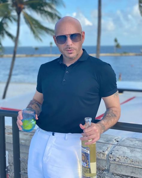 Pitbull Singer, Pitbull The Singer, Amanda Kloots, Pitbull Rapper, Patrick Schwarzenegger, White Slacks, Shaun White, Chelsea Handler, Ping Pong Paddles