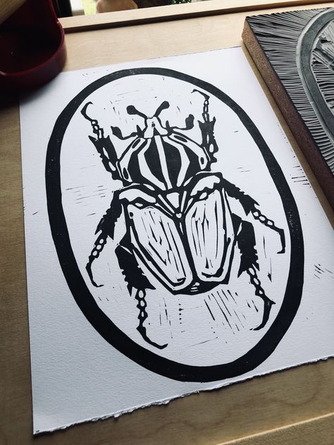 "Goliath Beetle" 9X12 Linocut Print. Beautiful Handmade Beetle Print with Oval Frame detail that makes the perfect decor statement piece! A hand printed original piece of art work. No two prints will be exactly the same! Packaged in a cellophane sleeve with card stock backing. Bug Linocut, Linocut Ideas, Goliath Beetle, Beetle Tattoo, Gelli Printing Techniques, Silversmithing Jewelry, Beetle Insect, Lino Art, Linocut Art