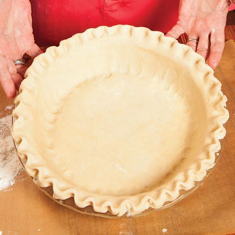 Even the most experienced cook can be intimidated when it comes to making pie crust, but you don’t have to turn to the premade product. Preparing a pie crust from scratch is fast and does not require any complicated equipment. Follow these steps to achieve a tender, flaky crust, as well as several ways to Paula Deen Pie Crust, Paula Deen Pie Crust Recipe, Deep Dish Pie Crust Recipe, Flakey Pie Crust, Perfect Pie Crust Recipe, Making Pie Crust, Pie Crust Uses, Pie Crust From Scratch, Pie Crust Recipe Easy