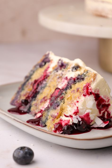 Blueberry Coconut Cake Coconut Blueberry Cake, Coconut Sponge Cake Recipe, Blueberry Coconut Cake, Coconut Roll Cake, Coconut Blueberry, Coconut Buttercream, Blueberry Cake Recipes, Blueberry Topping, Coconut Cake Recipe