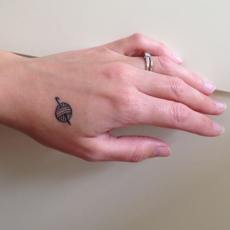 Tiny crochet hook and wool yarn tattoo -- love the idea! Thinking different placement... Tattoos For Crafters, Needle Point Tattoo, Wool Tattoo, Small Crochet Tattoo, Yarn Tattoo Ideas, Cat Yarn Tattoo, Craft Tattoo, Knit Tattoo, Crochet Hook Tattoo Ideas