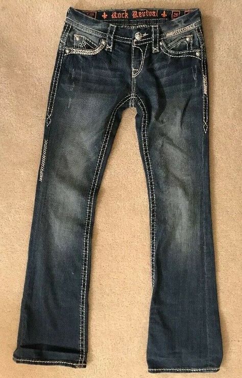 EUC! Womens Rock Revival Sasha Boot Jeans Sz 26 cool style! great fit Waist measures 30 inches Inseam measures 32 inches *Were hemmed with sticky tape that is still a little bit on inside (should come off over time)( see last picture ) Emo Jeans, Early 2000s Outfits, Robin Jeans, 2000s Outfits, Cargo Pants Outfit, Rock Revival Jeans, Boot Jeans, Sneakers Outfit, Miss Me Jeans