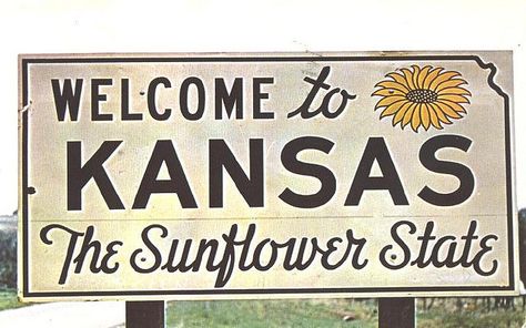 "Kansas - welcome sign" by 9teen87's Postcards on Flickr - Welcome to Kansas ~ the Sunflower State ~ These signs appear on all major highways as you cross the State Line to enter the Sunflower State ~ postmarked in 1959 with a 3 cent Liberty stamp. Kansas Day, State Of Kansas, Kansas Usa, Fire Pit Furniture, State Signs, Land Of Oz, Home On The Range, The Sunflower, 50 States