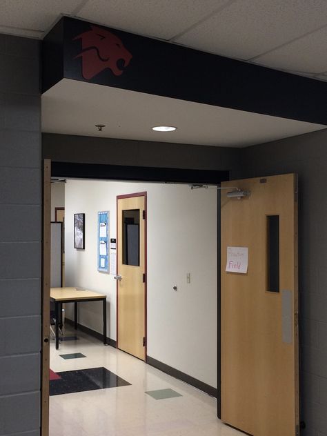 PACT classroom entrance (note wall colors, use of logo, geometric extension with drop-down level of ceiling) Classroom Entrance, Wall Colors, Entrance, Loft Bed, Loft, Ceiling, Bed, Wall, Furniture