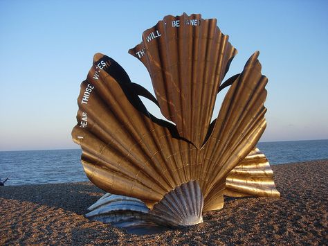 This sculpture by Maggi Hambling is known as 'The Aldeburgh Scallop' and is to be found on the beach between Thorpeness & Aldeburgh Maggi Hambling, Suffolk Coast, Sutton Hoo, Art Foundation, Seaside Town, Norway Travel, The Poet, Weekend Breaks, England And Scotland