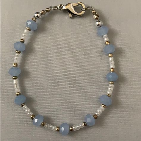 Handmade By Me, A Blue, White And Gold Small Bead Bracelet Accented In Silver. Bracelet Is 6 3/4” Long. Cute White Bracelets, Blue And Silver Beaded Bracelets, Gold And Silver Beaded Bracelets, Bracket Bead Ideas, Blue And Gold Beaded Bracelets, Black White Beaded Bracelet, Easy Bead Jewelry, A Bracelet Handmade, Blue Bracelets Diy