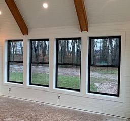 Fiberglass Windows Black, Black Window Interior Trim, Black Pella Windows, Window Trim Ideas Interior Black Windows, Black Fiberglass Windows, Pella Black Windows, Interior Black Windows With White Trim, Black Window With White Trim, Black Farmhouse Windows