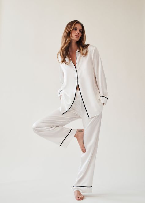 A luxurious option for evenings at home. Cut from fluid white sand-washed silk and edged in black grosgrain ribbon piping. Wear it with the coordinating silk pyjama shirt. Elegant Pajamas Classy, Silk Pyjama Aesthetic, Old Money Sleepwear, Classy Pajamas, White Silk Pajamas, Woman Pyjamas, Sleepwear Aesthetic, White Pyjamas, Luxury Pyjamas