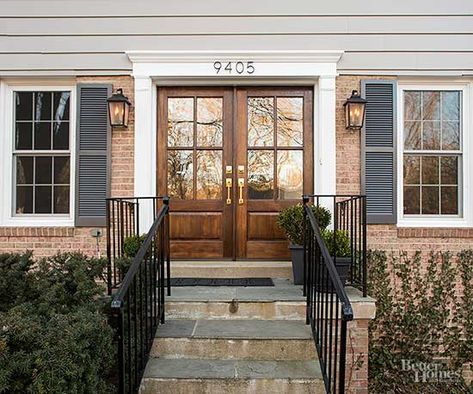 After: Warm Welcome Red Brick White Trim Exterior, Red Brick House With White Siding, Black Painted Stairs, Gray Siding, Red Brick Exteriors, Grey Siding, House Improvement, Virginia House, Big Personality