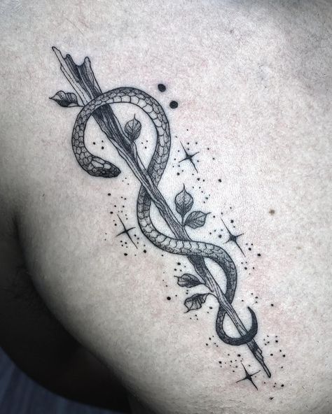 serpent + wand Snake With Arrow Tattoo, Arrow With Snake Tattoo, Harry Potter Tattoos Wand, Bronze Serpent Tattoo, Harry Potter Snake Tattoo, Harry Potter Tattoos Snake, Apple Tattoo, Wand Tattoo, Tiny Tats