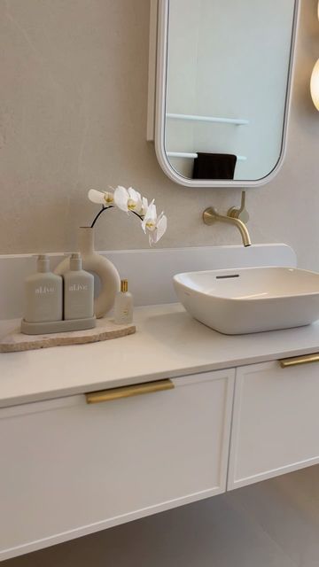 Home Bathroomware | Australian Made Vanities on Instagram: "Admiring the beautiful Japandi vibes of this ensuite 🤍

Designed by @alisa_lysandra, this bathroom is the epitome of luxury and beauty. Its gentle colours highlight timeless design elements, transforming the space into a serene retreat.

Featuring our curved Flo Vanity.
 
#homebathroomware #bathroomdesign #bathroomremodel #homeremodel #remodel #bathroomvanity #luxurybathroom #japandiinteriors #interiordesign" Japandi Vanity, Ensuite Design, Japandi Interiors, Colored Highlights, Luxury Bathroom, The Space, Windsor, Home Remodeling, Bathrooms Remodel