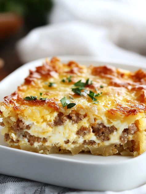 Sausage, Egg & Cream Cheese Hash Brown Breakfast Casserole - Taste Of Recipe Challah Breakfast Casserole, Brunch Recipes Egg Casserole, Sausage Egg Cream Cheese Hash Brown Casserole, Make Ahead Breakfast Strata, Breakfast Casserole Eggs And Sausage, Sausage Egg And Cream Cheese Casserole, Breakfast Bundt Casserole, Egg Bake Casserole With Hashbrowns, Ground Breakfast Sausage Recipes