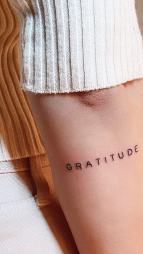 Subtle, small mantra word tattoo for women. Text Tattoo Arm, Simple Word Tattoos, Gratitude Tattoo, Ephemeral Tattoo, Font Tato, Wörter Tattoos, Tattoo Over Scar, Tattoo Design For Hand, Text Tattoo