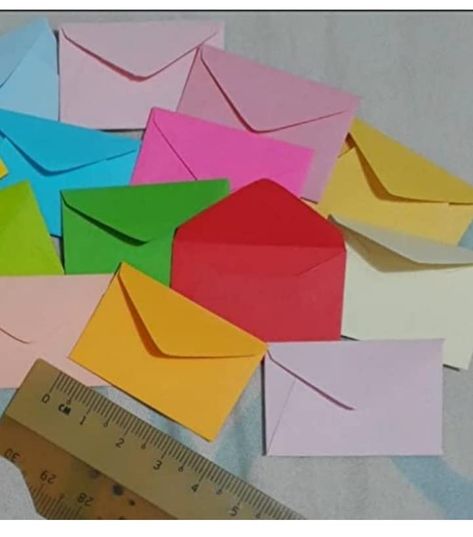 Amazon.com: 50 Miniature Envelopes, 1x1.5", tiny cute little tooth fairy envelopes, a set of 50 small color envelopes : Handmade Products Tooth Pulled, Tooth Fairy Letter, Tiny Envelopes, Lost Tooth, Handmade Envelopes, The Dentist, Mini Envelopes, First Grade Teachers, Envelope Sizes