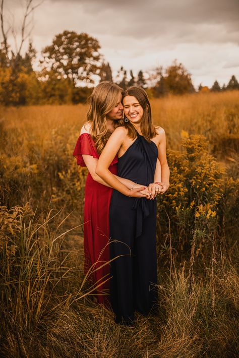 Lesbian Engagement photos, outfit ideas, fancy outfit, two women, fall photos, nature, feminine, chiffon dress, Ann Taylor jumpsuit, burgundy, navy. Formal sunset. Michigan. Grand Rapids. The Highlands. Alejandro Photography. Lesbian Engagement Pictures, Nature Feminine, Lesbian Engagement Photos, Engagement Photos Outfit Ideas, Formal Engagement Photos, Lesbian Engagement, Fall Couple Photos, Fall Couple, Engagement Picture Outfits