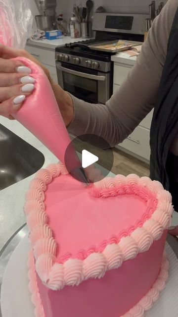 Whitney Berge on Instagram: "💕 I have been loving all of these cute Vintage Heart Cakes this year. 💕  They are such a popular cake design, and I love that you can use any color schemes to match your event. I thought I would show you how I decorate my favorite style of vintage heart-shaped cakes, and share all of the details. 💕  Cake size- 6” regular  Cake Flavor- Sprinkle Chip Frostings- TBWB American Buttercream  Piping tips used: @wiltoncakes Wilton 4B, Wilton 32, Wilton 126, Wilton 3.  Colors- @Chefmaster Neon Pink & Rose Pink   If you have ever wanted to learn how to decorate this or any other style of cakes, you can sign up for one of my classes.   Sign up for a class at: www.theblondewhobakes.com 💕  This cake was made for my beautiful friends over at @Mixhers LLC. They make my fa How To Frost A Heart Shaped Cake, Heart Shape Cake Servings Chart, Heart Buttercream Cake, 6in Heart Cake, How Decorate Cake, Heart Cake Piping Tips, Heart Shaped Cakes Simple, Decorating Heart Shaped Cakes, 21st Birthday Cake Heart Shape