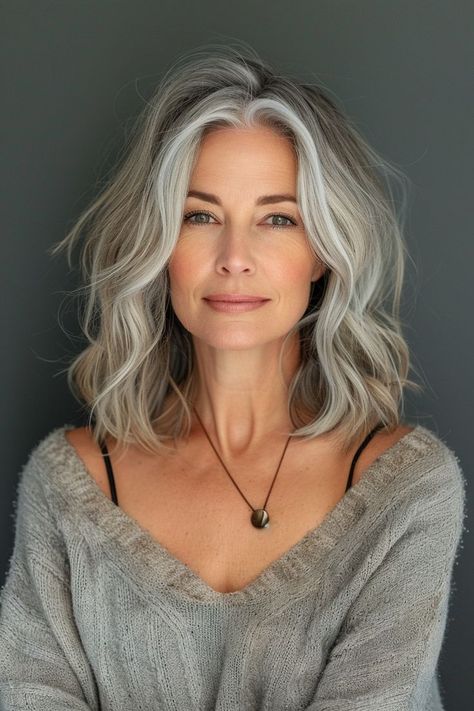 Discover 9 silver fox hairstyles for women over 50, celebrating the elegance and sophistication of natural gray hair. Medium Length Gray Hairstyles For Women Over 50, Goals 2024, Style Theory, Dread Head, Curly Styles, Grey Hair Transformation, Kadeřnické Trendy, Gorgeous Gray Hair, Grey Hair Inspiration