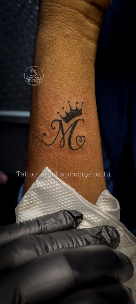 Initial Crown Tattoo, Madelyn Tattoo Name, M With Crown Tattoo, King Crown Tattoo Design For Men, Crown With Name Tattoo, Letter With Crown Tattoo, Initial With Crown Tattoo, M Name Tattoo, Letter M With Crown