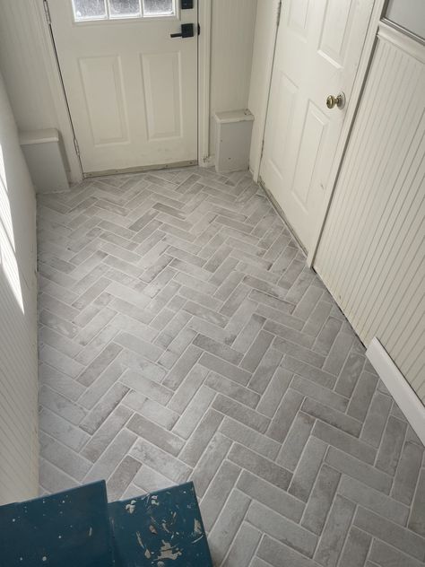 Brick Look Tile Floor Laundry Room, Brick Tile Herringbone Floor, Tile Floors For Mudroom, Gray Brick Flooring, Brick Look Porcelain Floor Tile, Brick Floors Bathroom, Small Entrance Flooring Ideas, Brick Tile Laundry Room, Gray Floors Bathroom