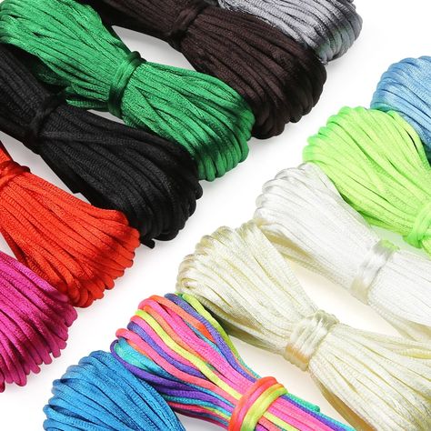 PRICES MAY VARY. ❤Material: beading cord is made of nylon, satin cord, rattail cord, atin cord,nylon cord satin. ❤Size: 2 mm, good quality chinese cord, rattail silk cord, satin string cord. ❤Rattail Cord Color: rainbow, red, white, black, wine red, powder blue, dark blue, light yellow, lucifer yellow, green, brown, gray ❤Satin nylon cord is great for beading, chinese knot decoration, jewelry making such as necklace and bracelet. The perfect gift for Mother's Day, Father's Day, Thanksgiving Day, Necklaces, Plaits, Chinese Knotting Cord, Chinese Knotting, Bracelet Beading, Beading Jewelry, Starter Kit, Myanmar, Different Colors