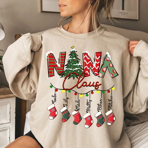 Santa Christmas Gift Blessed Nana And Kids CTH01 Sweatshirt Cute and Creative Designs: Exquisite and lovely patterns, special elements make the perfect designs. The people who wear them will be proud. At the same time, they also show the love for family. Suitable for many occasions such as Christmas, Father's Day, Mother's Day, birthday This classic crew-neck sweatshirt is an essential basic item for anyone's wardrobe. The ribbed cuffs on the sleeves and waist are reinforced, and the high-qualit Nana Claus Shirt, Nana Christmas, Samsung Flip, Shirt Decals, Santa Sweatshirt, Christmas T Shirt Design, Custom Kids, Sweatshirt Cute, Sweatshirt Christmas