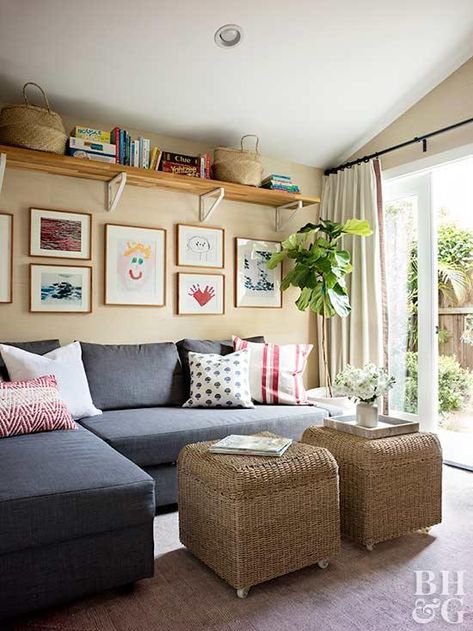 This California Bungalow Home Stays Cool in 550 Square Feet | Better Homes & Gardens High Up Shelves, High Shelves Around The Room, High Ceiling Living Room Shelves, Bungalow Living Room Ideas Small Spaces, High Shelving Around Room, Shelves Near Ceiling, Shelves Along Ceiling, High Shelf Living Room, Living Room Shelves Wall Shelves