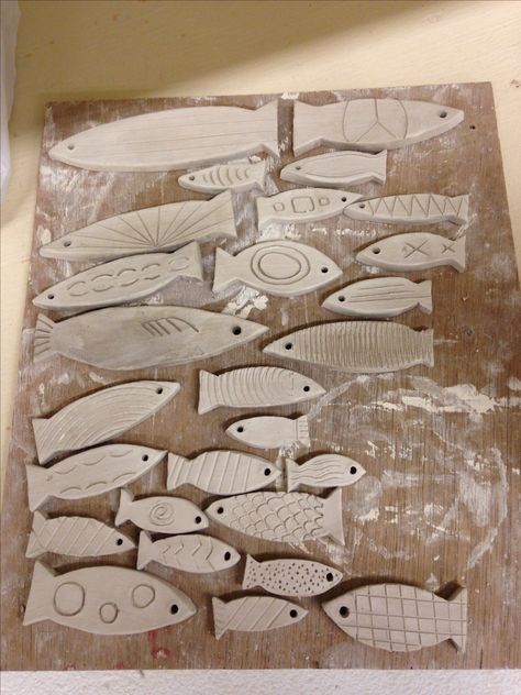 Clay fish with different designs. Clay Fish, Fish