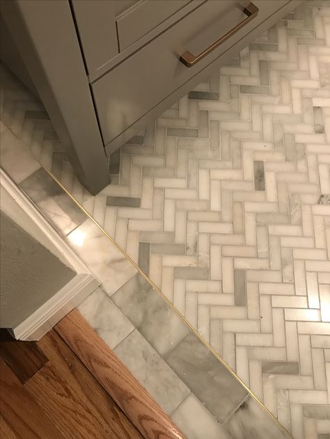 Marble herringbone and inlaid solid brass detail; bathroom tile floor Marble Herringbone Bathroom, Herringbone Bathroom Floor, Herringbone Kitchen Backsplash, Floor Herringbone, Marble Herringbone Floor, Bathroom Tile Floor, Bathroom Brass, Herringbone Tile Floors, Marble Bathroom Floor